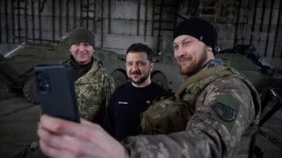 Zelensky visits frontline, deadly Russian strikes hit school, homes