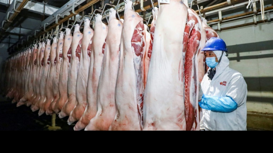 Inflation: la Chine puise dans ses réserves nationales de porc