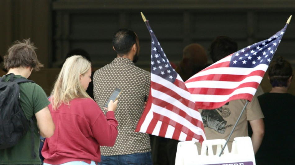 Stock markets climb, dollar dips as US votes