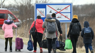 La Russie sous pression internationale croissante, combats dans le nord-est de l'Ukraine