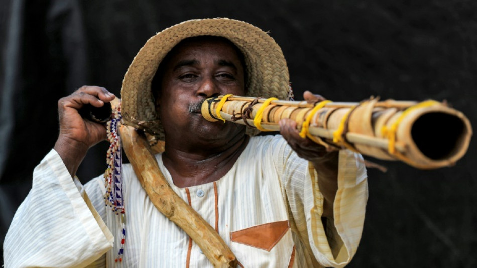 Sudan traditional wind instrument trumpets harvest time