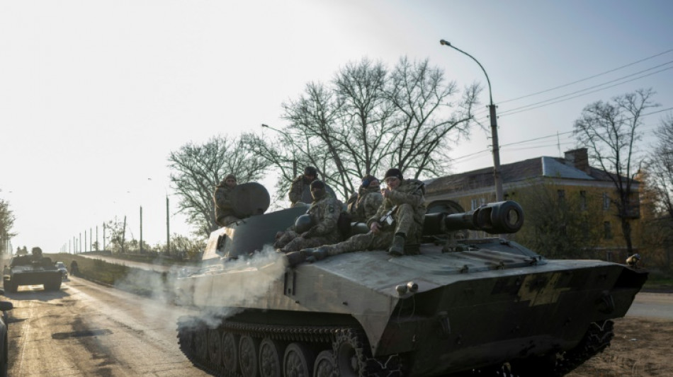 Ukraine cautious as Russia orders troops out of Kherson