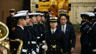 Japan PM pledges to boost military capacity