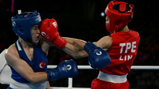 Taiwanese boxer in Paris Olympics gender row eases into final