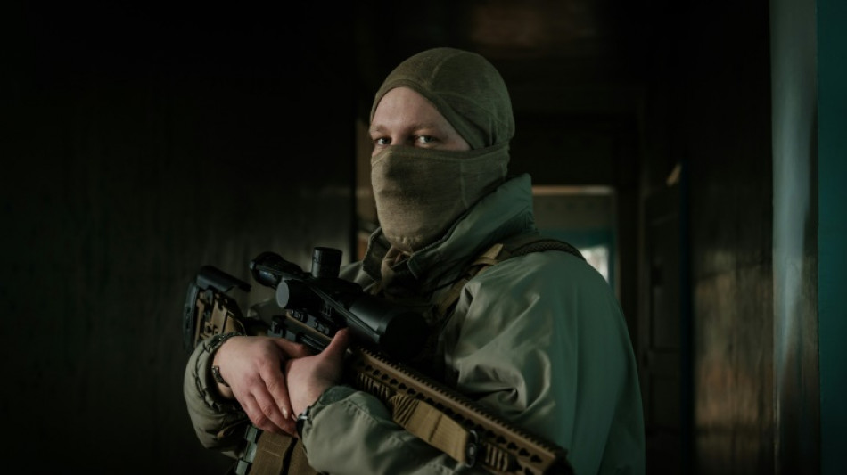 In eastern Ukraine, snipers watch and wait