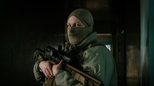 In eastern Ukraine, snipers watch and wait