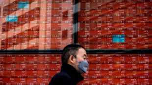 Asian markets sink as traders fret over global outlook