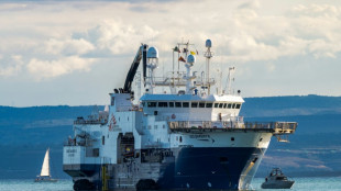 Migrants come ashore at Sicily port as France points finger at Italy