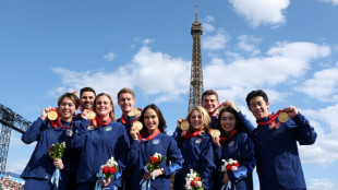 Medals from doping-tainted 2022 Olympic team skating awarded in shadow of Eiffel Tower