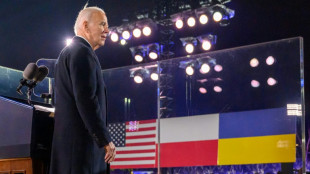 In warzone and Warsaw speech, Biden touts US strength -- and his own 