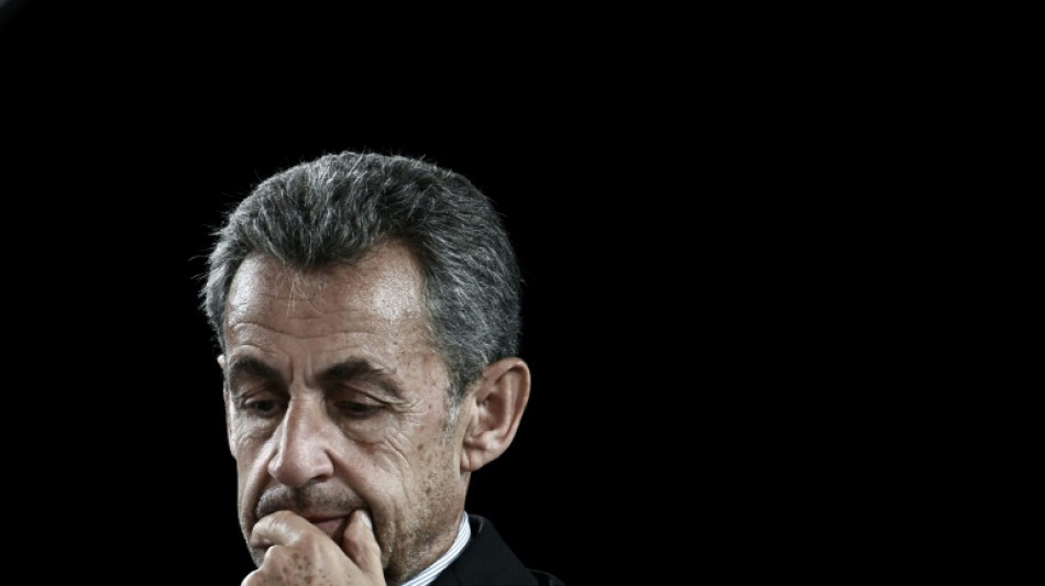 French appeal court cuts Sarkozy illegal campaign funding sentence