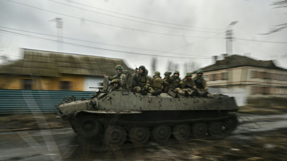 Ukrainian soldiers wait to reinforce 'real hell' of Bakhmut
