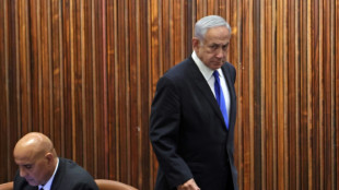 Israel's Netanyahu pauses judicial reform that split nation