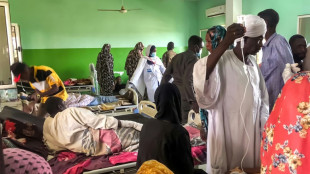 Stench of death engulfs Sudan hospitals, but leaving is mortal danger