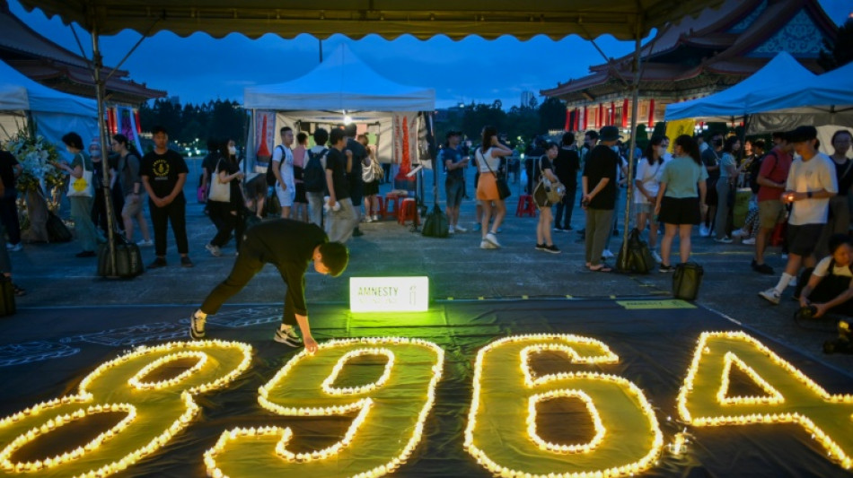 Hong Kong police detain more than 20 on Tiananmen anniversary