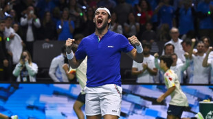 Berrettini takes Italy to brink of Davis Cup defence