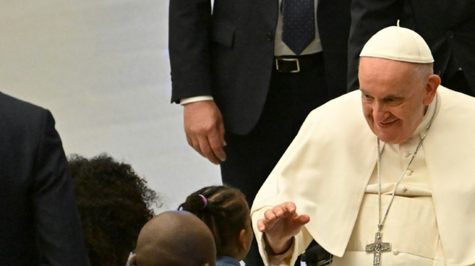 Pope greets refugees helped through Christian 'corridors'