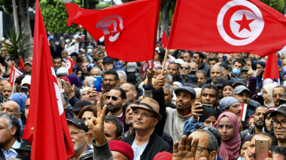 Tunisians vote in second round of poll for defanged parliament