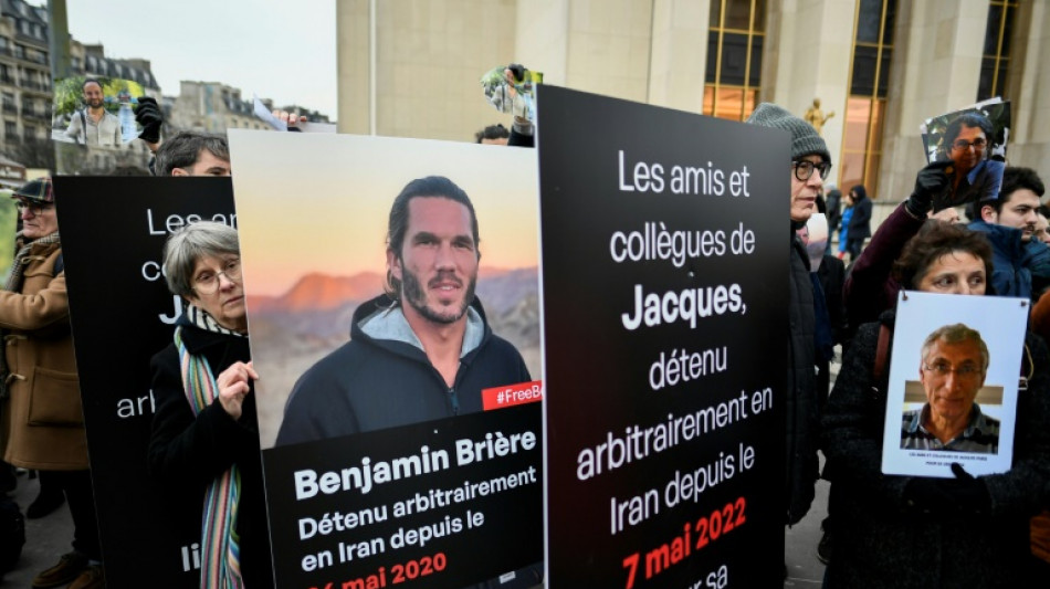 'Unbearable distress': families rally for French held in Iran