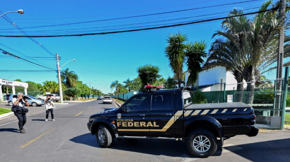 Brazil police raid Bolsonaro's home, seize phone