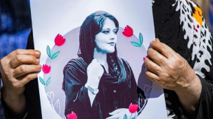 Iranians take to streets for 12th night of women-led protests