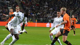 Rudiger's brave header sends Madrid into Champions League knock-outs