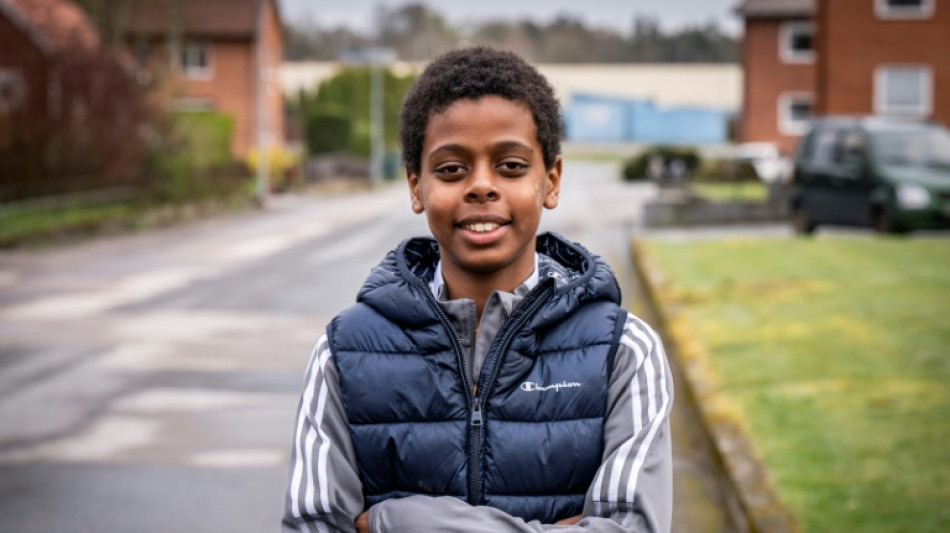 Child asylum seeker wins hearts with Swedish charity record