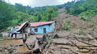 Search for survivors after Indian floods, landslides kill 65