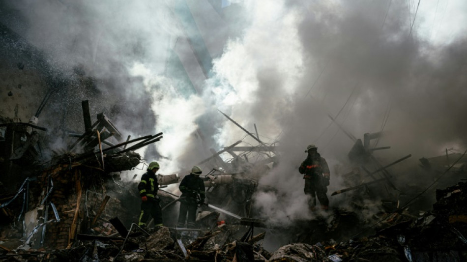 Death toll from missiles on Ukraine town rises to 14