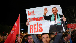 Resurgent Erdogan heads for historic election runoff