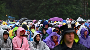 Lauryn Hill, Red Hot Chili Peppers draw fans to rainy Central Park aid fest