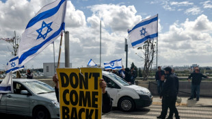 Netanyahu faces critics in Berlin amid 'civil war' warning