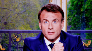 Macron seen singing in the streets after pensions address