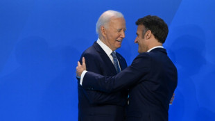 At NATO summit, allies delicately lend Biden a hand 