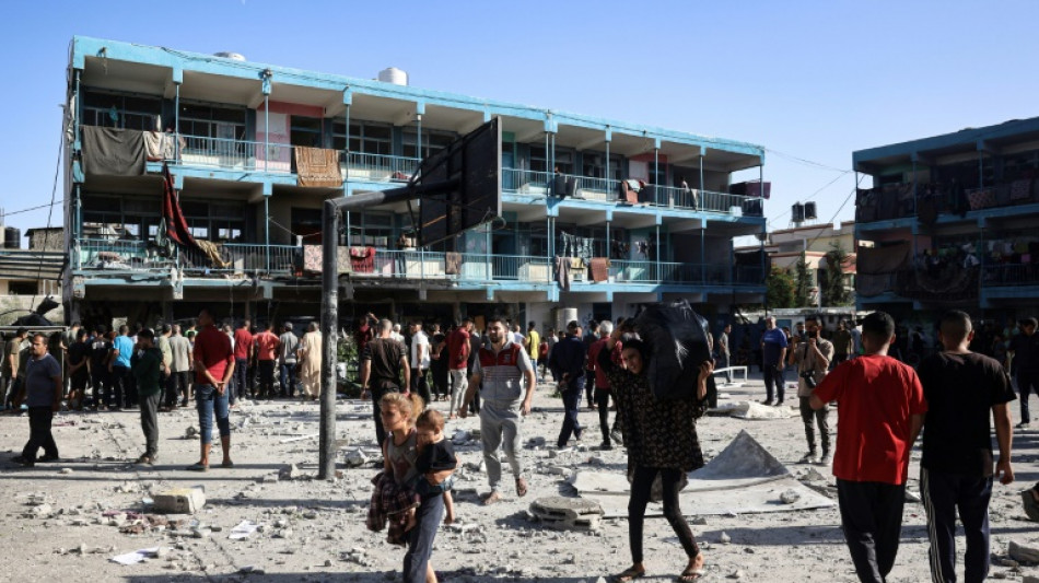 Gaza rescuers say Israeli strike on school killed 18