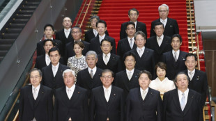 Japan govt admits doctoring 'untidy' cabinet photo