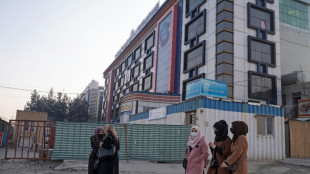 'Hugs, screams and cries': Afghan women anguished at university ban