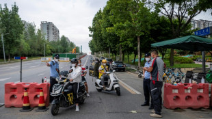 Covid: des millions d'habitants confinés dans l'une des plus grandes villes de Chine