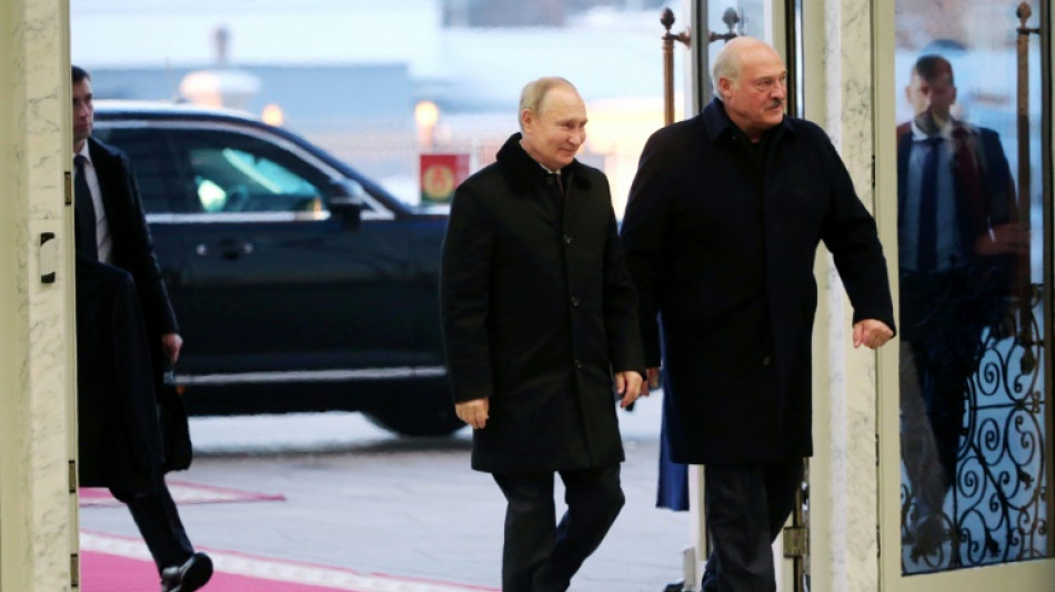 Putin insists no plan to absorb Belarus on visit in Ukraine shadow