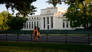 Markets surge on interest rate hopes