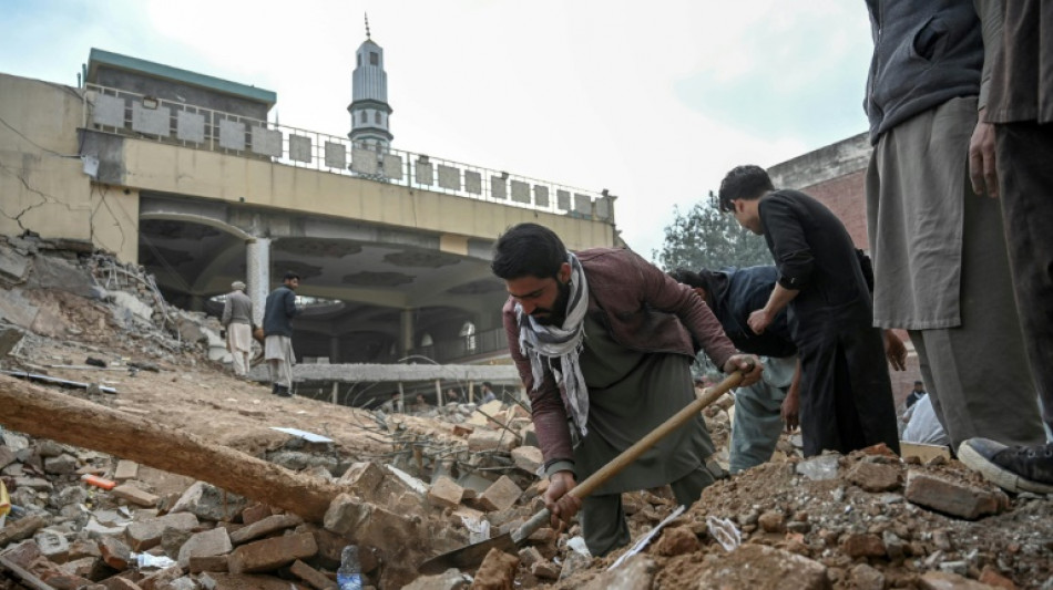 Pakistan mosque suicide bomber 'was in police uniform'