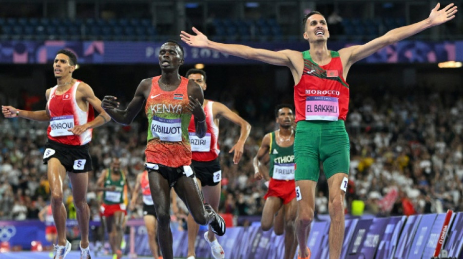 El Bakkali retains Olympic steeplechase title as Girma suffers bad fall