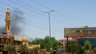 Thousands flee 'bodies on the streets' in battle-scarred Khartoum