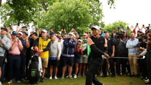 Tiger fades to last at rain-hit Southern Hills