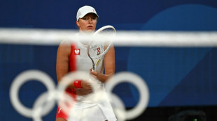 Swiatek shines at rain-swept Olympics tennis