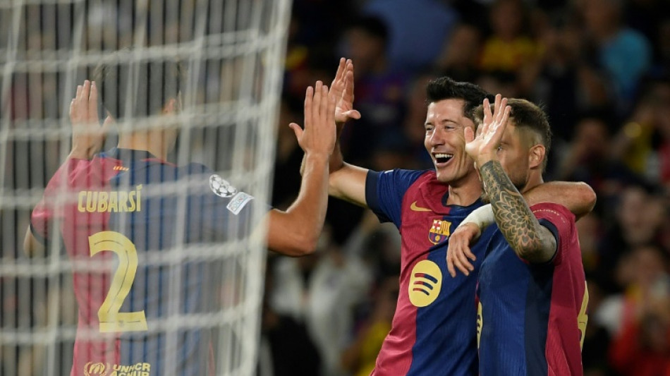 Lewandowski hits brace as Barca crush Young Boys