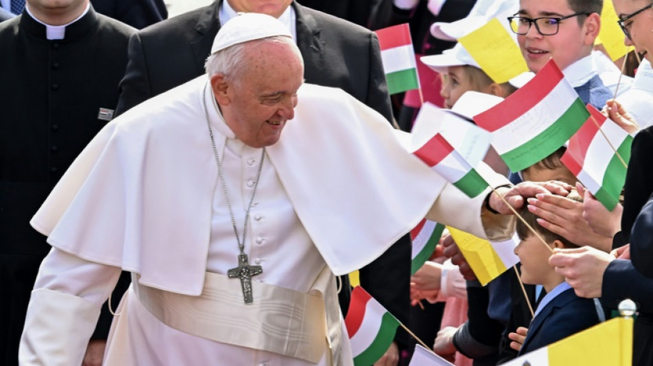 Pope warns against indifference, meets refugees in Orban's Hungary