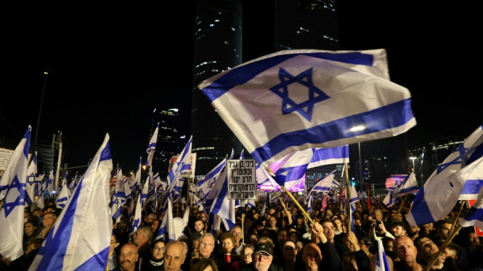 Former PM joins mass rally against Israel govt