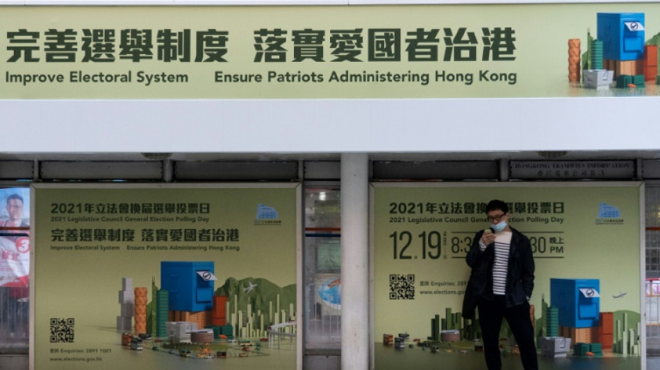 Hong Kong charges four for reposting election boycott calls