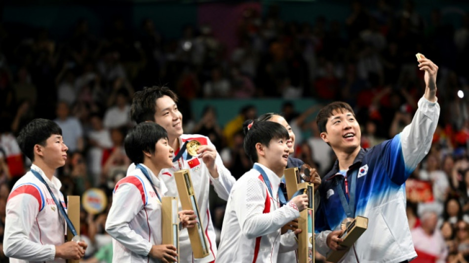 North-South Korea Olympic podium selfie goes viral